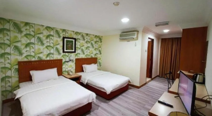 Bed in D'Borneo Hotel