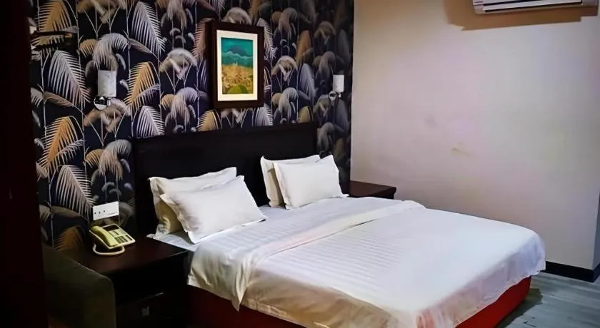 Bed in D'Borneo Hotel