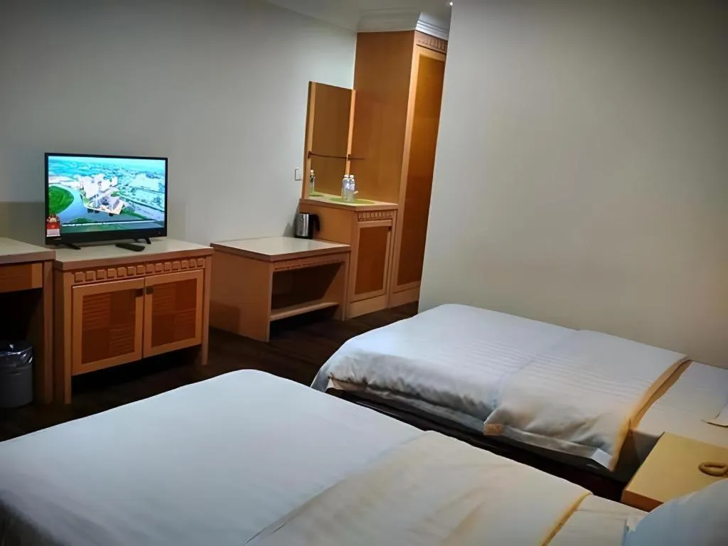 Bed in D'Borneo Hotel