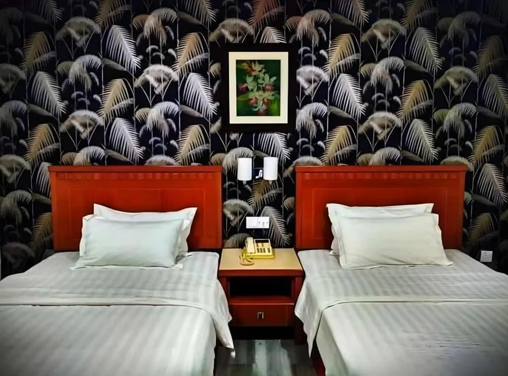 Bed in D'Borneo Hotel