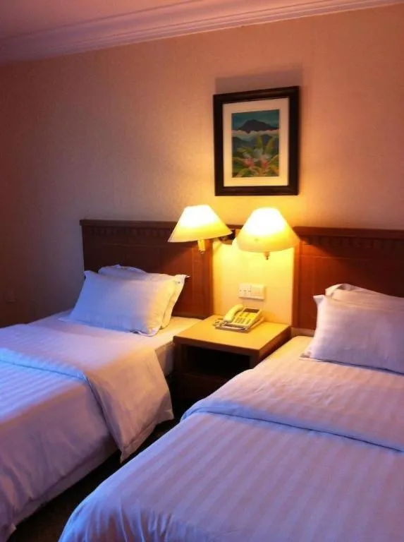 Bed in D'Borneo Hotel