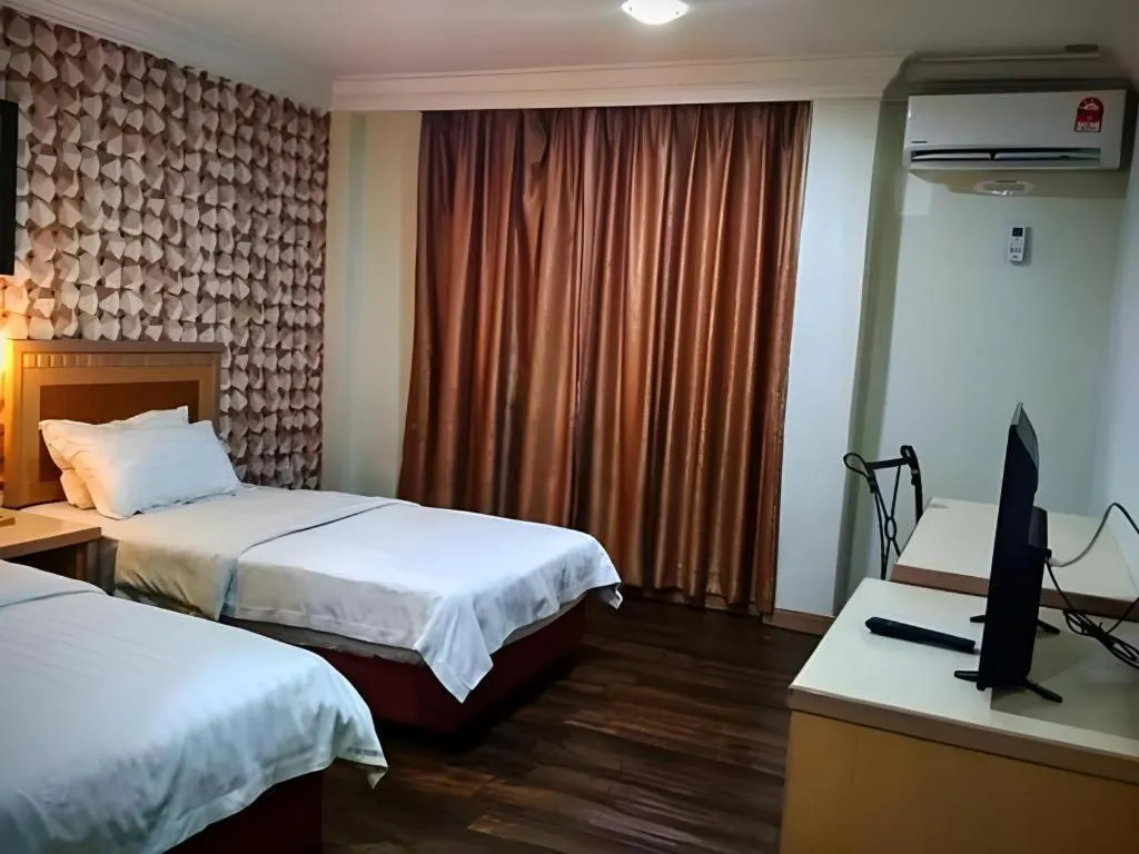 Bed in D'Borneo Hotel