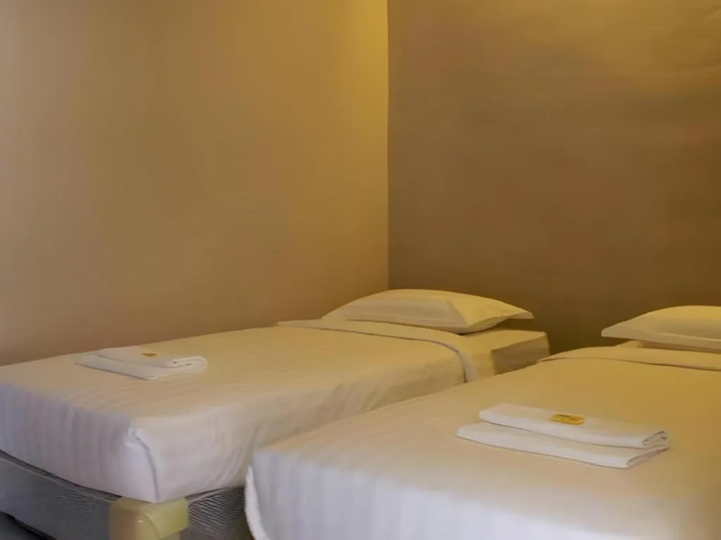 Bed in D'Borneo Hotel