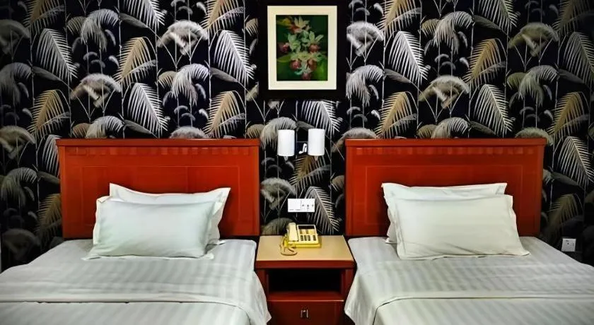 Bed in D'Borneo Hotel