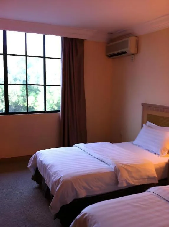 Bed in D'Borneo Hotel