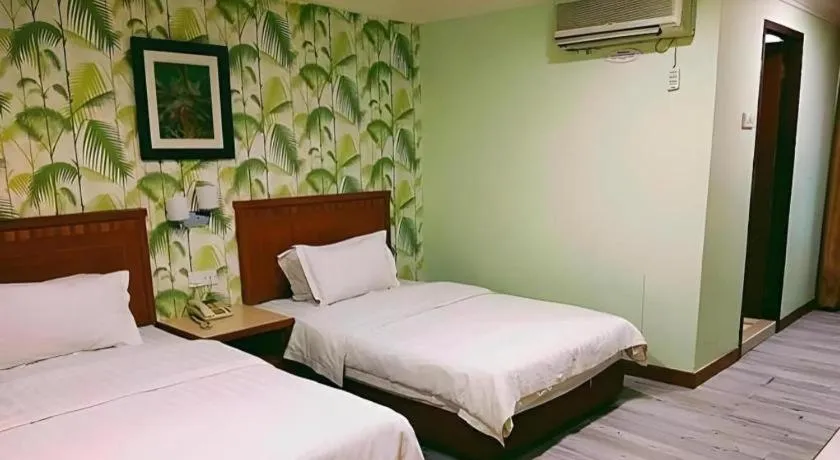 Bed in D'Borneo Hotel