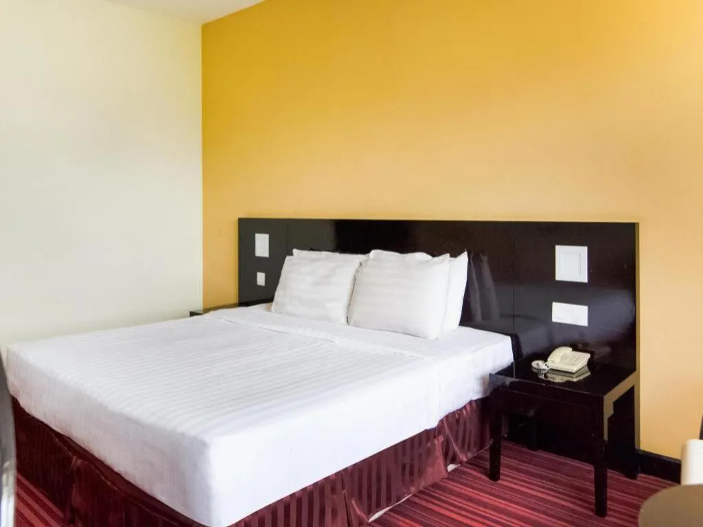 Bed in Perkasa Hotel Keningau