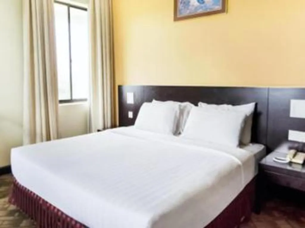 Bed in Perkasa Hotel Keningau