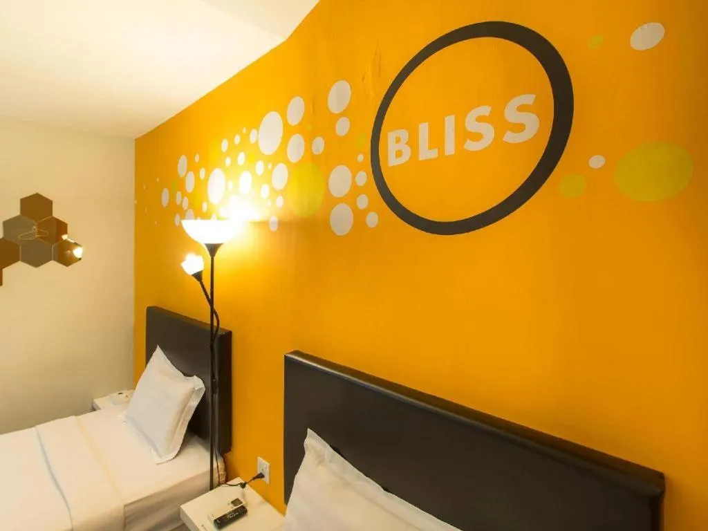 Bed in Bliss Boutique Hotel