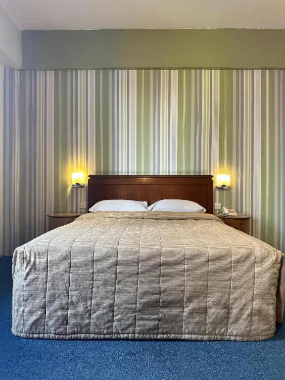 Bed in Klang Histana Hotel