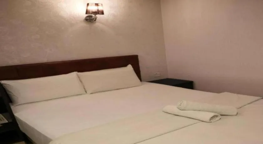 Bed in Hotel O D Nice Inn Hotel