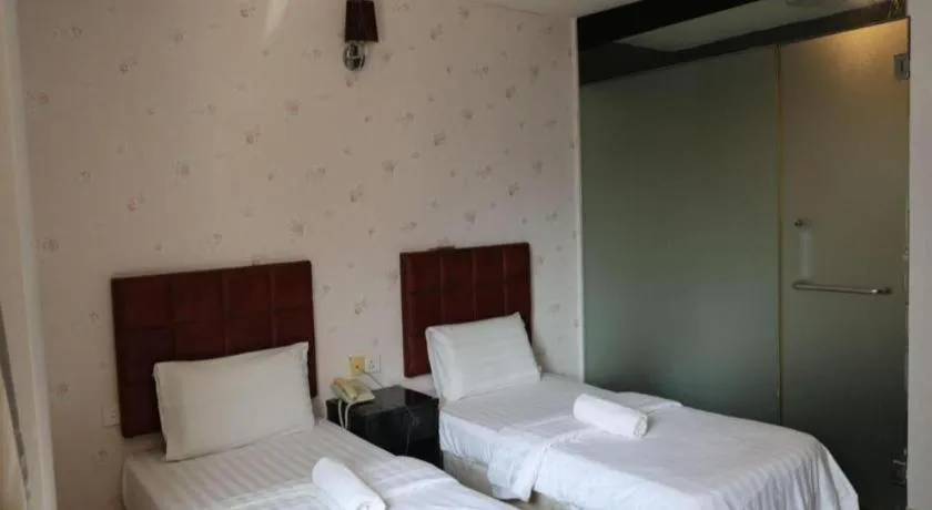 Bed in Hotel O D Nice Inn Hotel