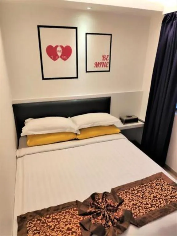 Bed in Hotel Zamburger Plaza Mahkota