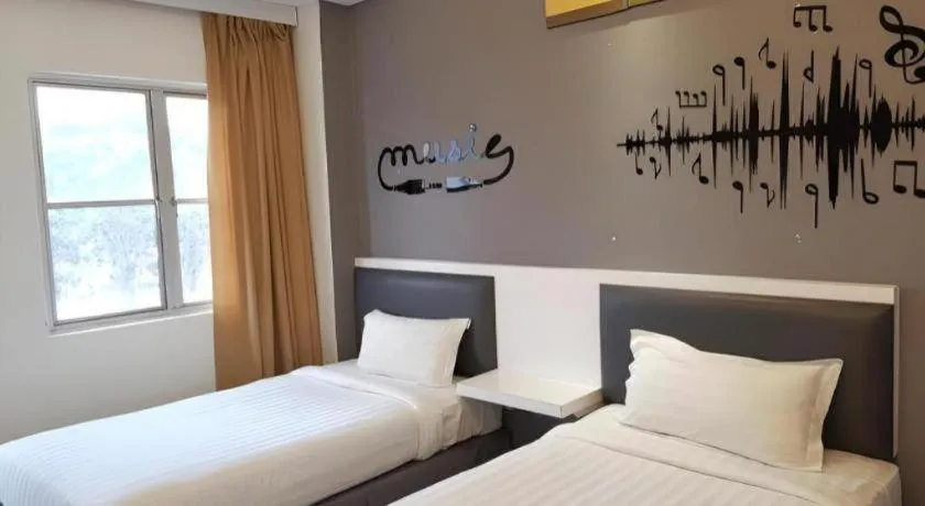 Bed in Hotel Zamburger Plaza Mahkota