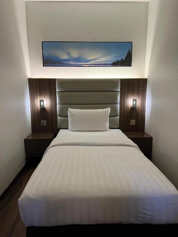 Bed in The Landmark Hotel