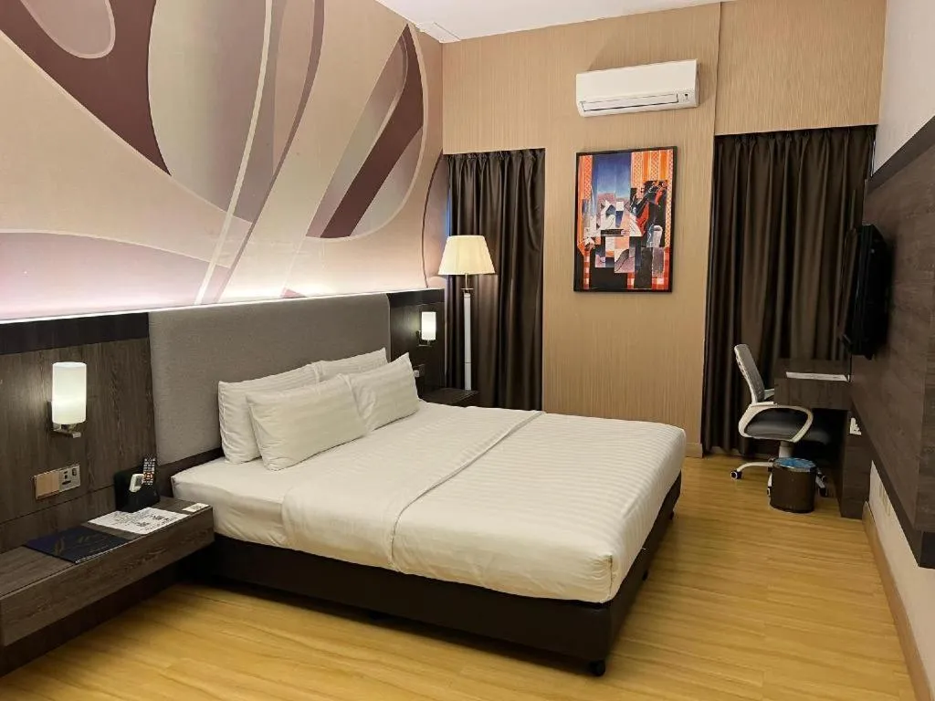 Bed in The Landmark Hotel