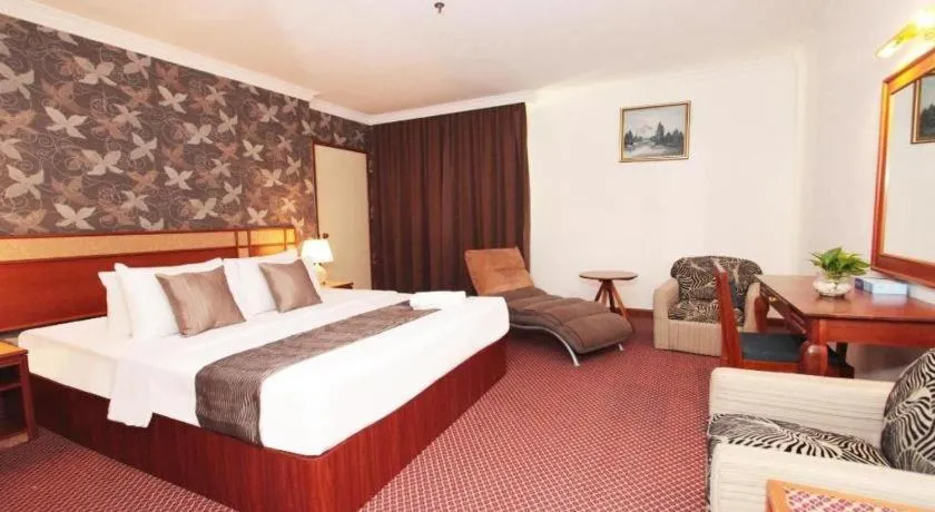 Bed in Pelican Hotel