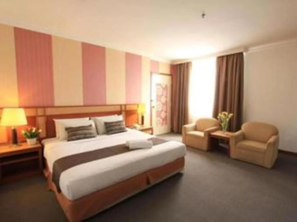 Bed in Pelican Hotel