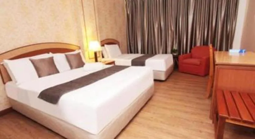 Bed in Pelican Hotel