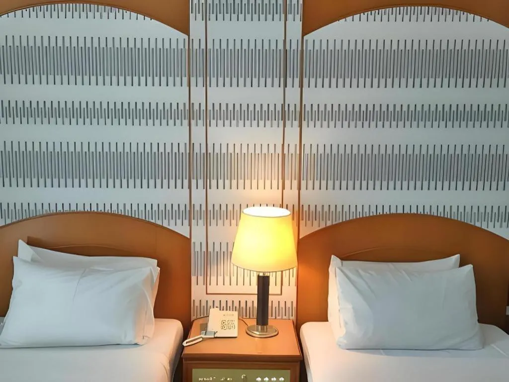 Bed in Pelican Hotel