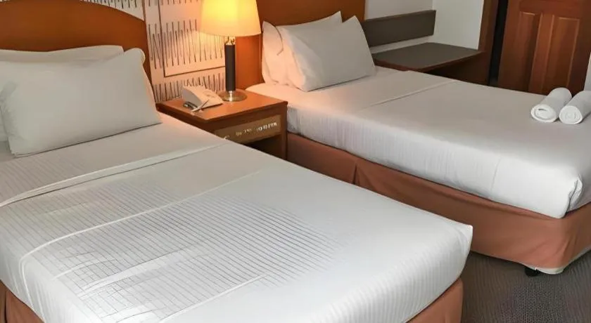 Bed in Pelican Hotel