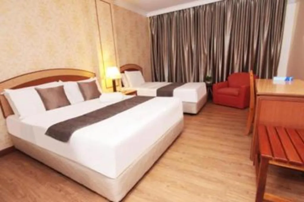 Bed in Pelican Hotel