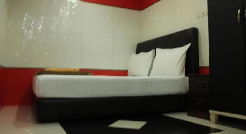 Bed in New Wave Hotel Melawati