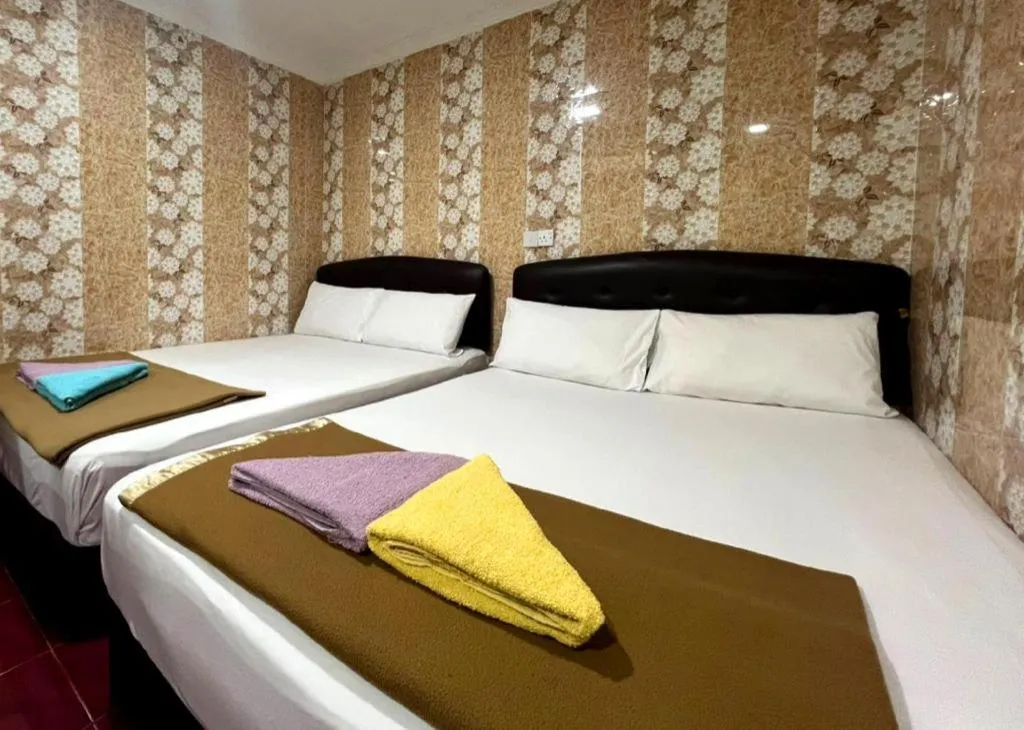 Bed in New Wave Hotel Melawati