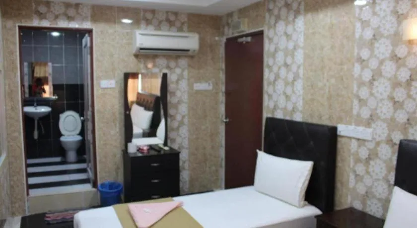 Bed in New Wave Hotel Melawati