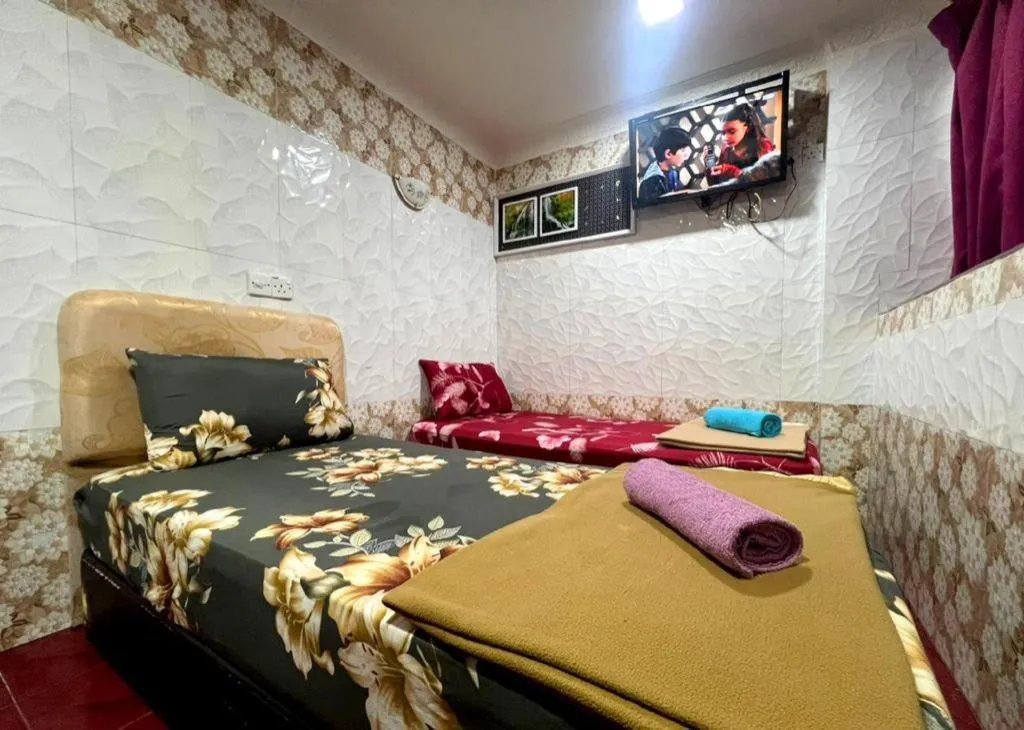 Bed in New Wave Hotel Melawati