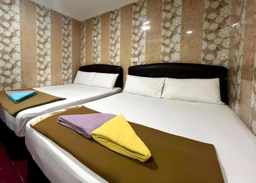 Bed in New Wave Hotel Melawati