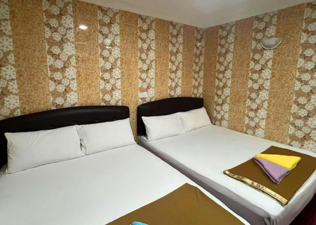 Bed in New Wave Hotel Melawati