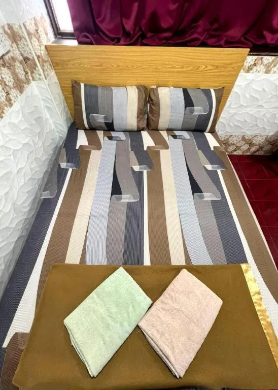 Bed in New Wave Hotel Melawati