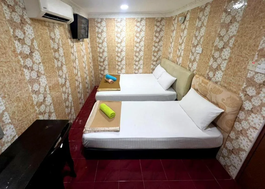 Bed in New Wave Hotel Melawati