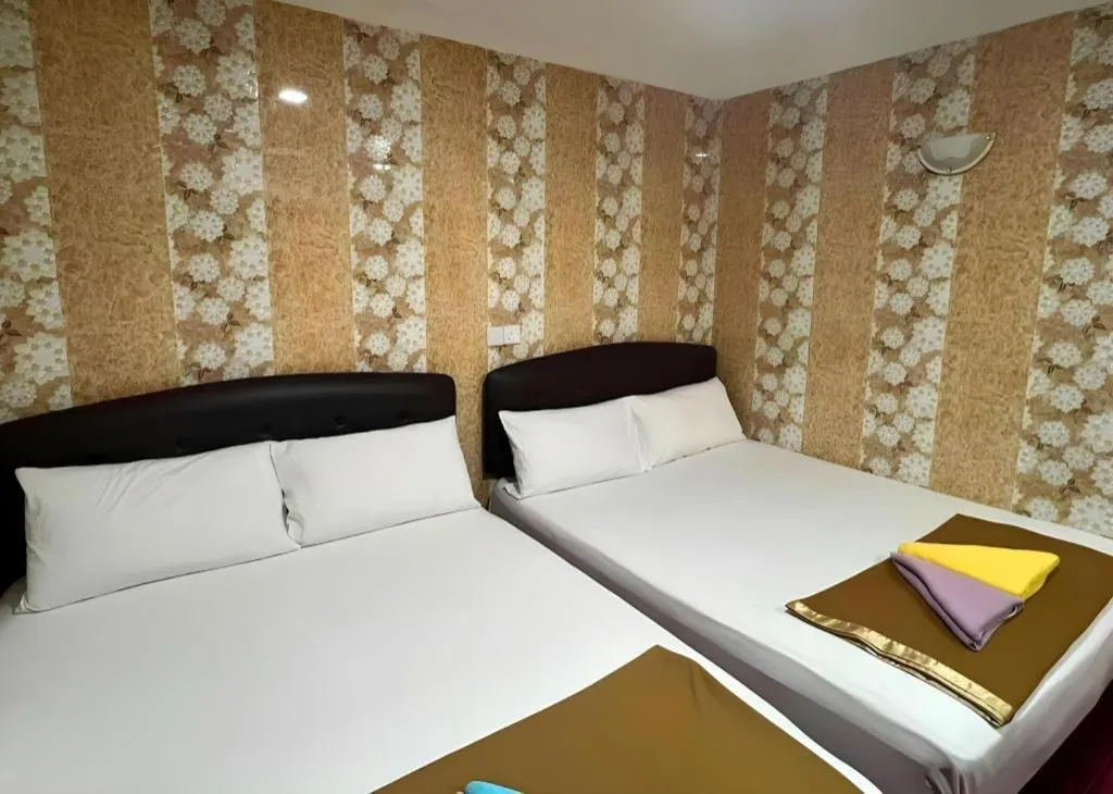 Bed in New Wave Hotel Melawati