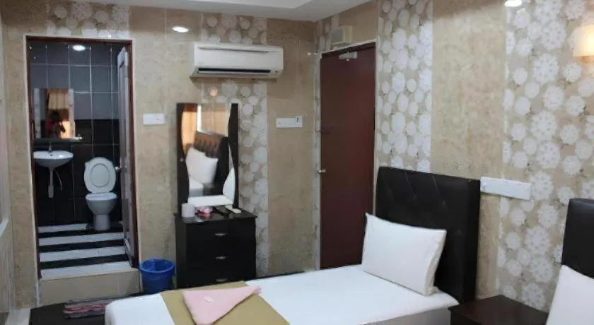 Bed in New Wave Hotel Melawati