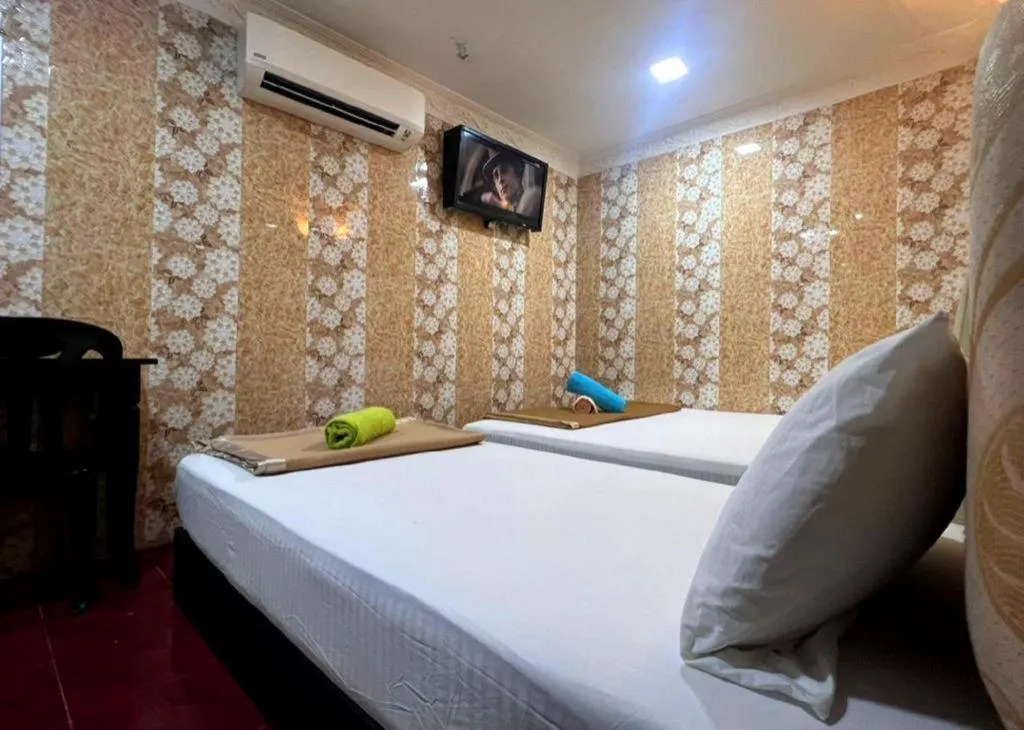 Bed in New Wave Hotel Melawati
