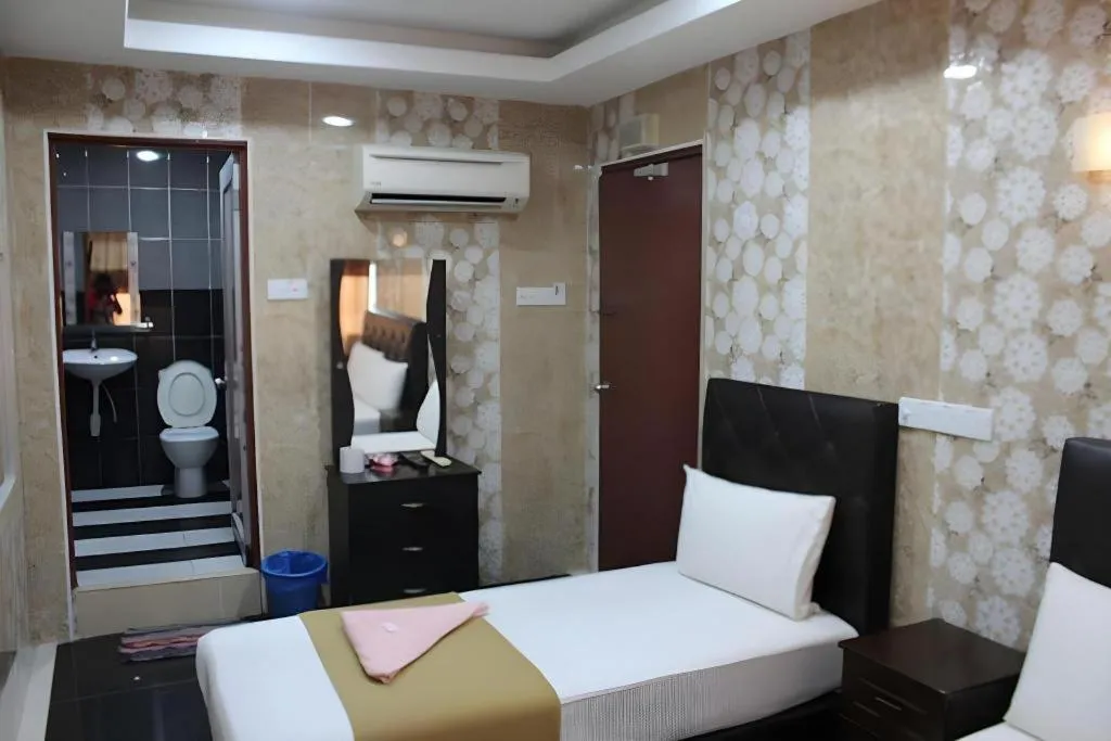 Bed in New Wave Hotel Melawati