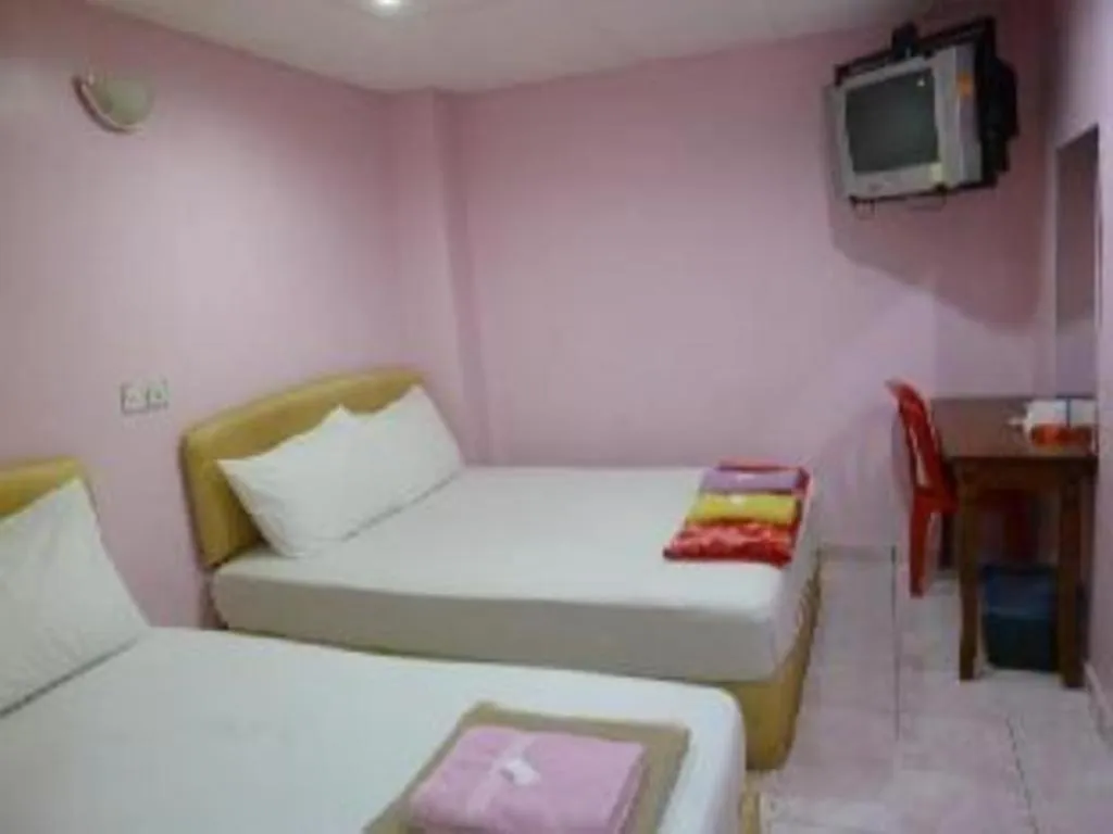 Bed in New Rawang Hotel