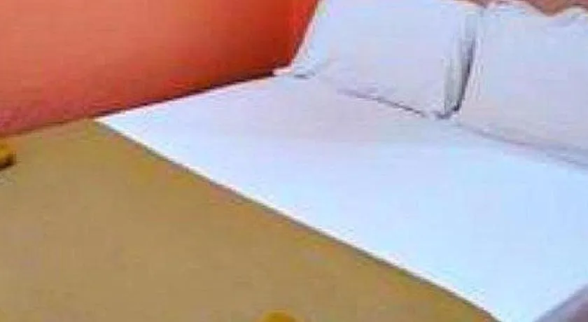 Bed in New Rawang Hotel