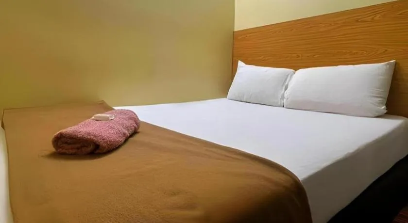 Bed in New Rawang Hotel