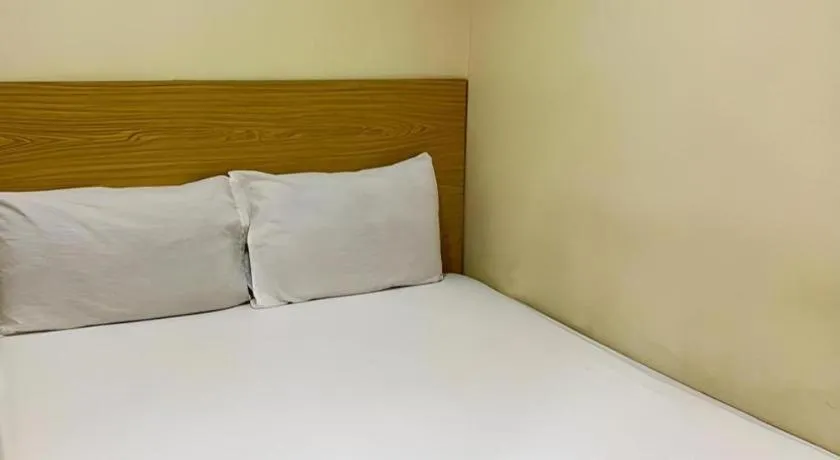 Bed in New Rawang Hotel