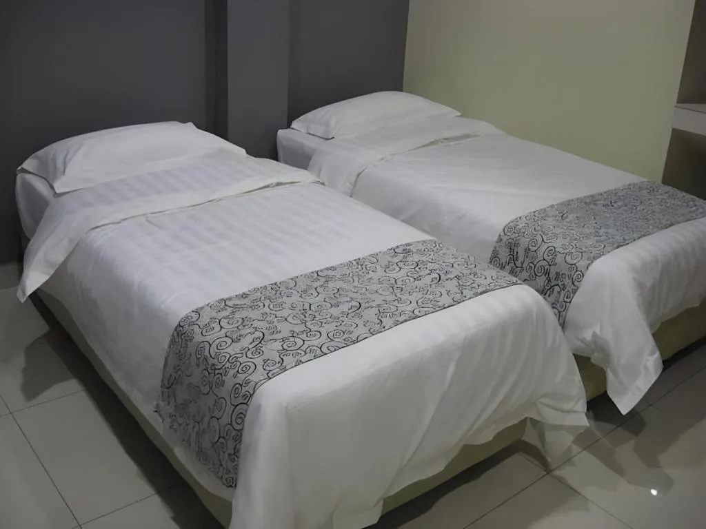 Bed in Hii-5 Hotel