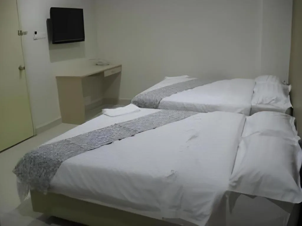Bed in Hii-5 Hotel