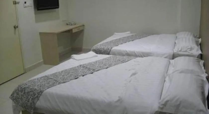 Bed in Hii-5 Hotel