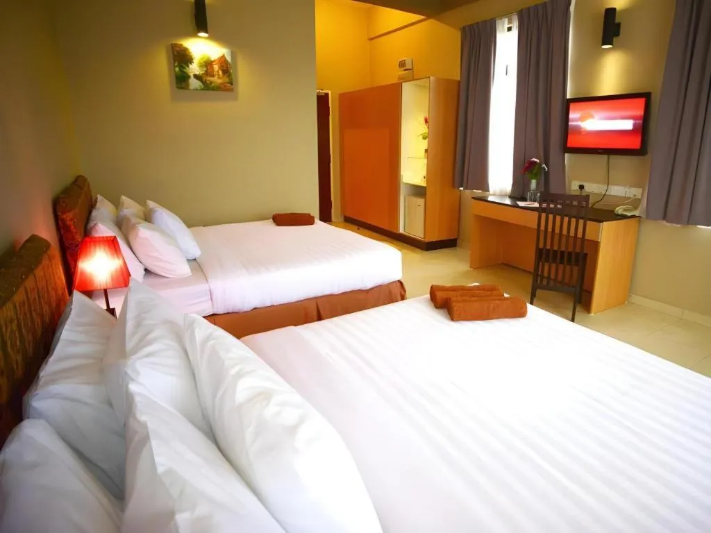 Bed in City Times Hotel