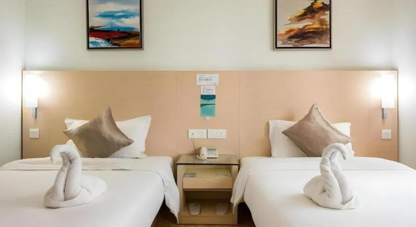 Bed in Hotel City Comfort Inn