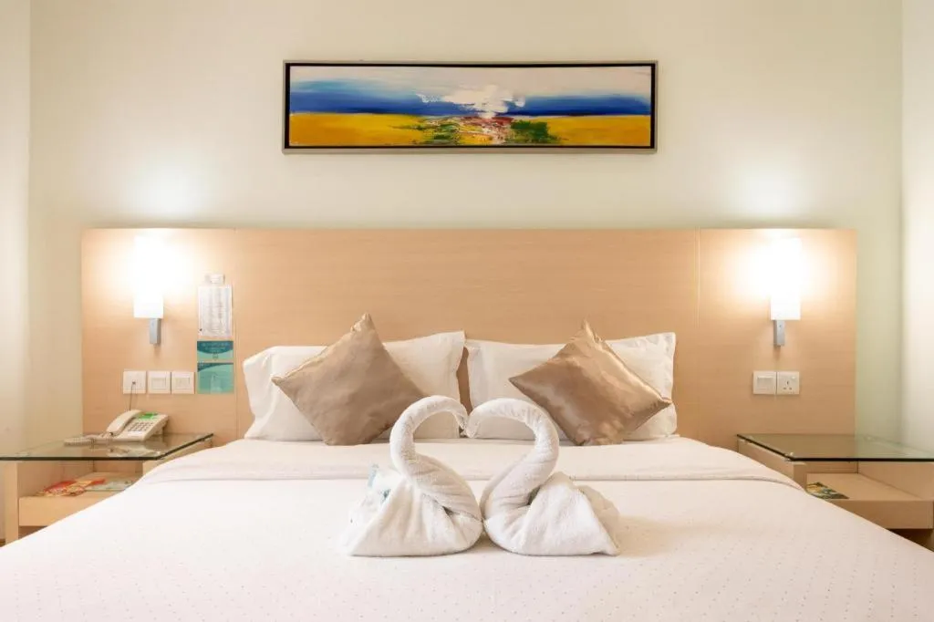 Bed in Hotel City Comfort Inn