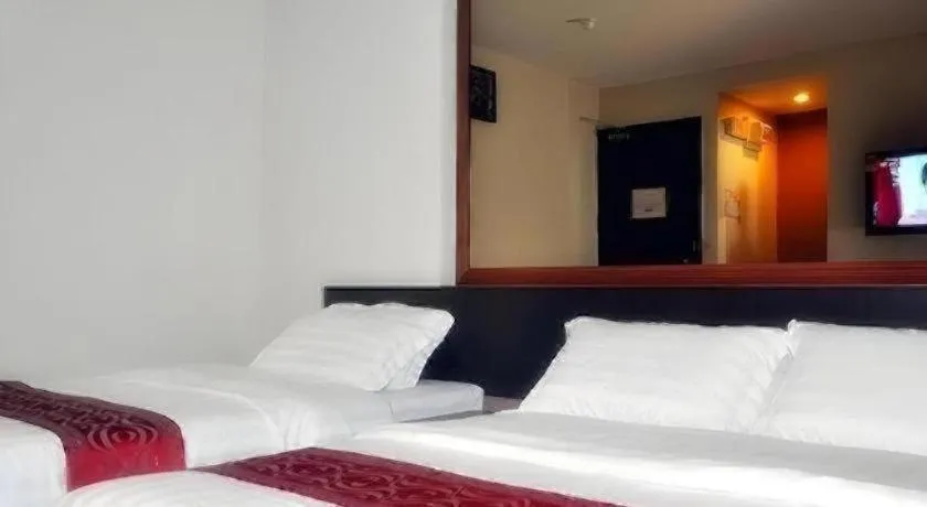 Bed in Goldenhill Hotel