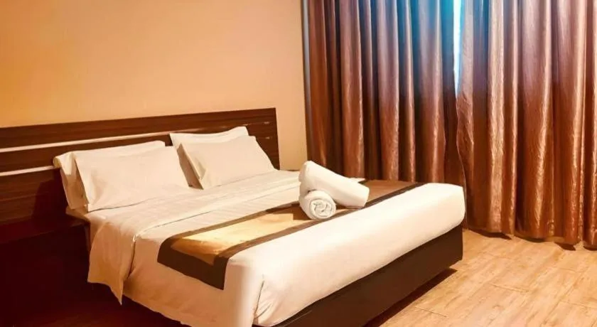 Bed in Goldenhill Hotel
